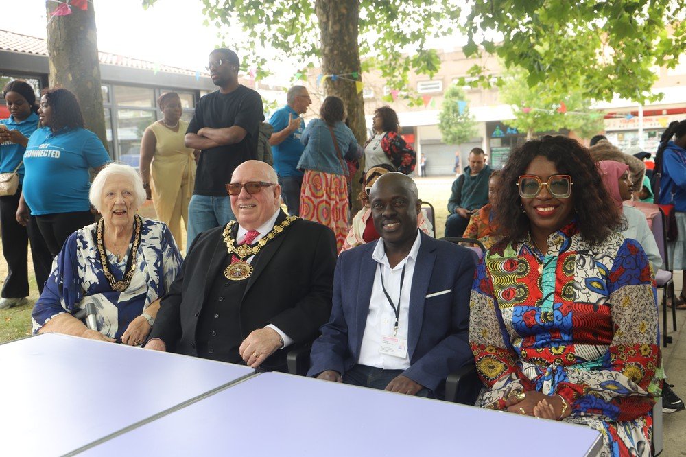 Ceremonial Mayor Robin Garrido, Mayoress Karen Garrido, Councillor Wilson Nkurunziza, Councillor Hilaria Asumu seated together during the opening welcoming ceremony