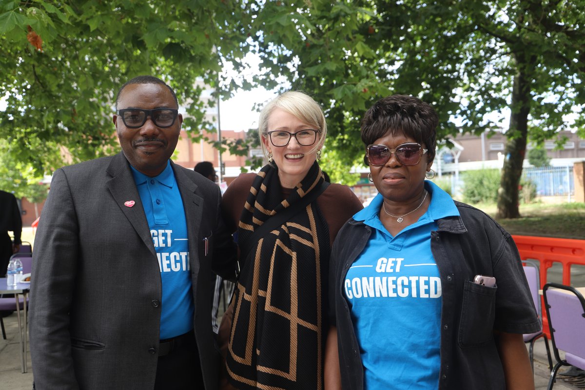 Member of Parliament for Salford, Rebecca Long-Bailey, MP, smiling brightly alongside Connect Talent CIO CEO, Dr. Ola Ojerinola, and Ruth during the outdoor festivities