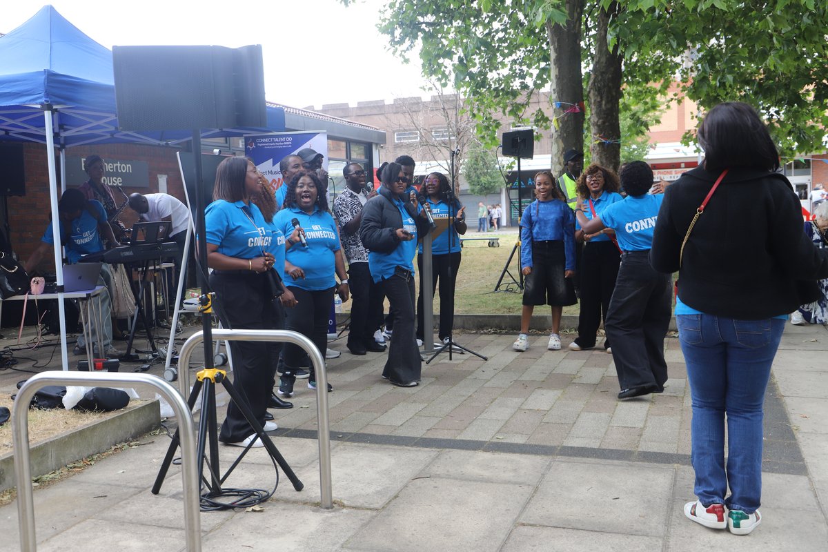 The Connect Talent Choir filling the courtyard with joyful song and vibrant energy