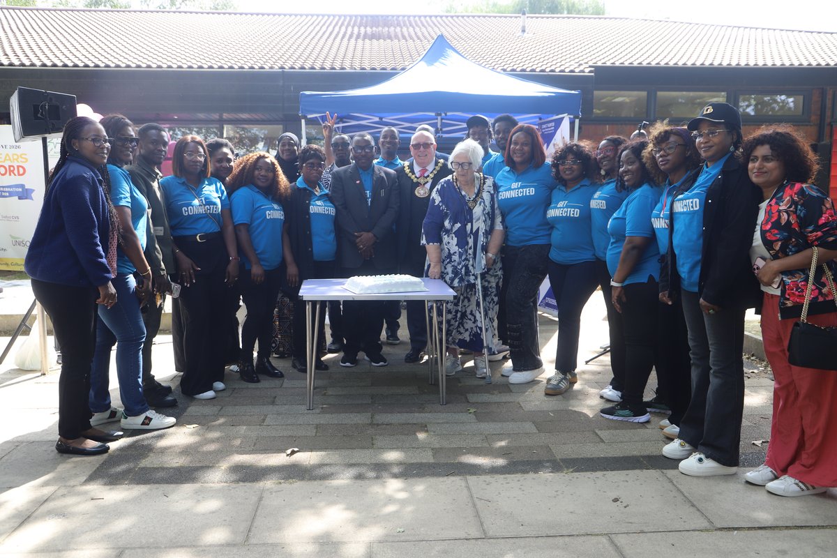 Our dedicated Trustees and hardworking volunteers smiling together in their bright blue Connect Talent T-shirts